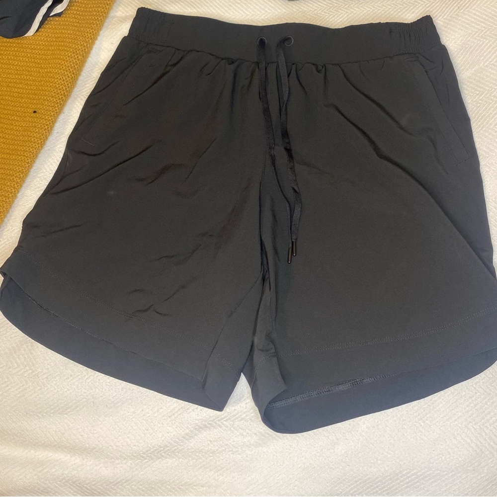 Black mid thigh athletic shorts